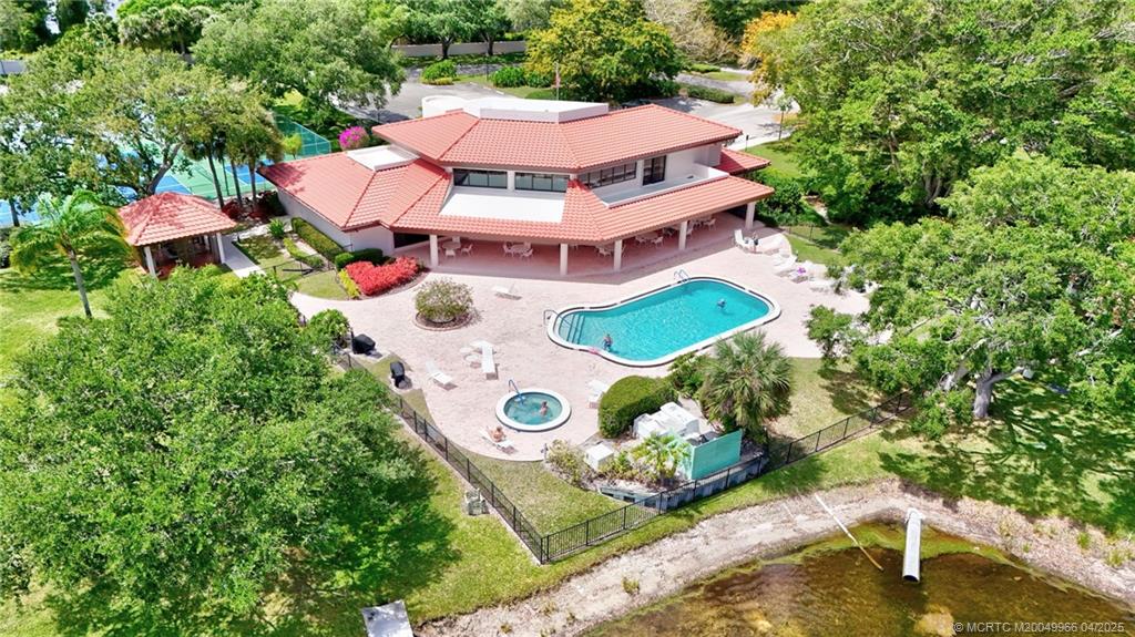 3401 Southeast Martinique Trace, Unit 101 Stuart, FL 34997 - Photo 50 of 51 an aerial view of house with yard