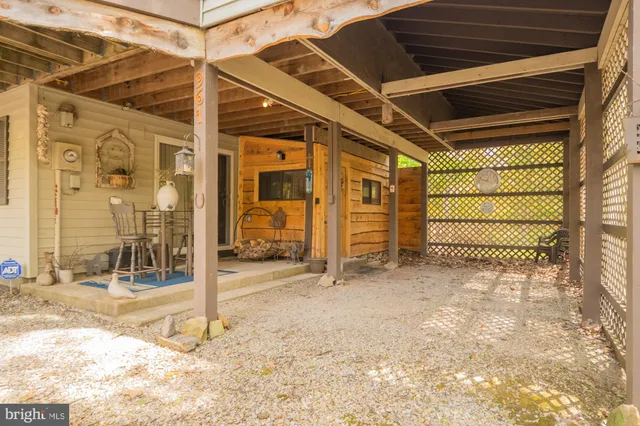 a view of a room with wooden walls