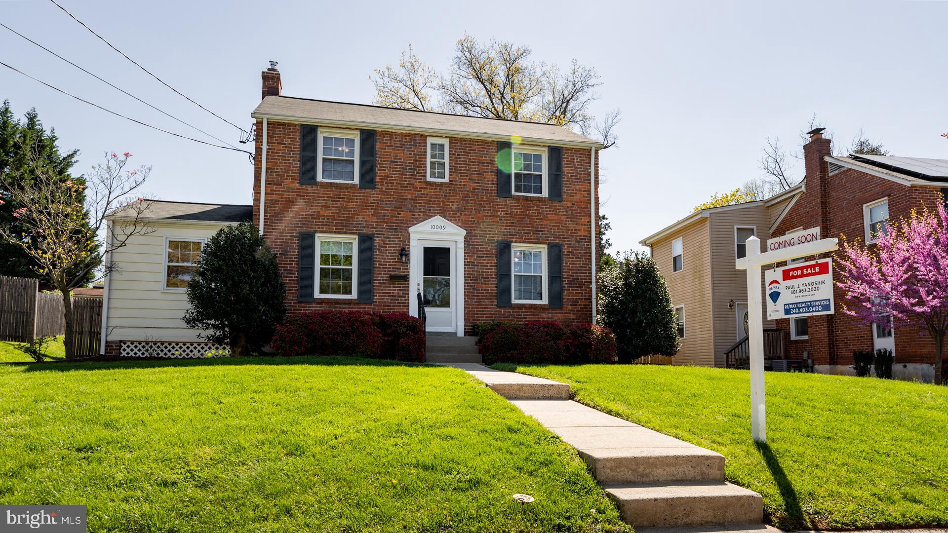 10009 Raynor Road Silver Spring, MD 20901 - Photo 1 of 34 a front view of house with yard and green space