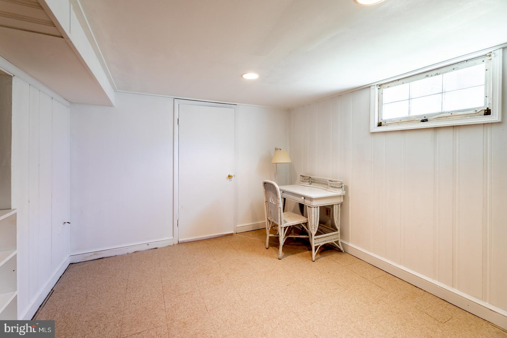 10009 Raynor Road Silver Spring, MD 20901 - Photo 22 of 34 a dining room with furniture and a window