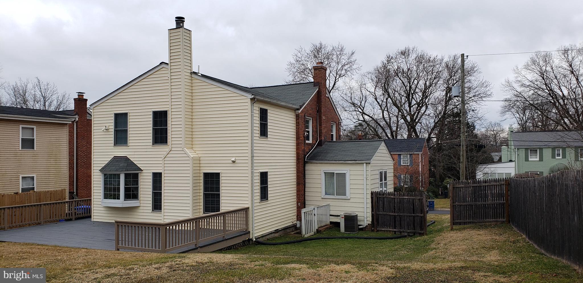 10009 Raynor Road Silver Spring, MD 20901 - Photo 26 of 34 a view of a house with a yard