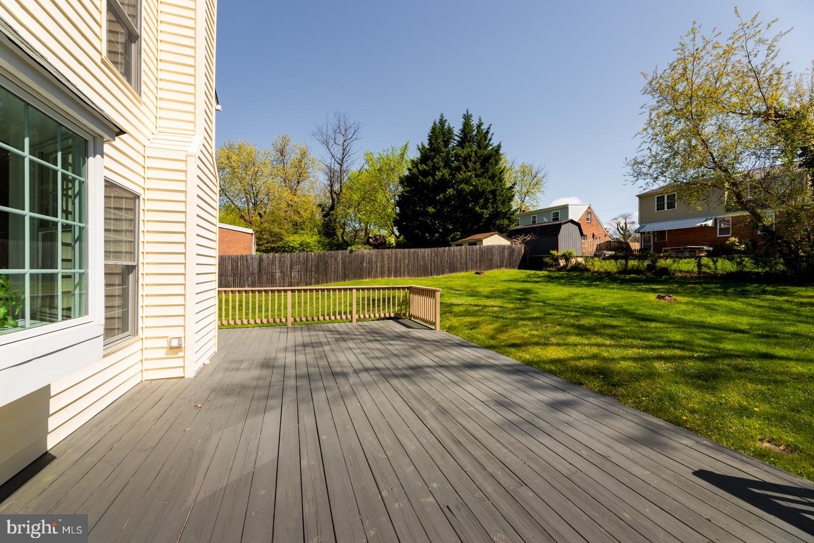 10009 Raynor Road Silver Spring, MD 20901 - Photo 27 of 34 a view of a house with a yard