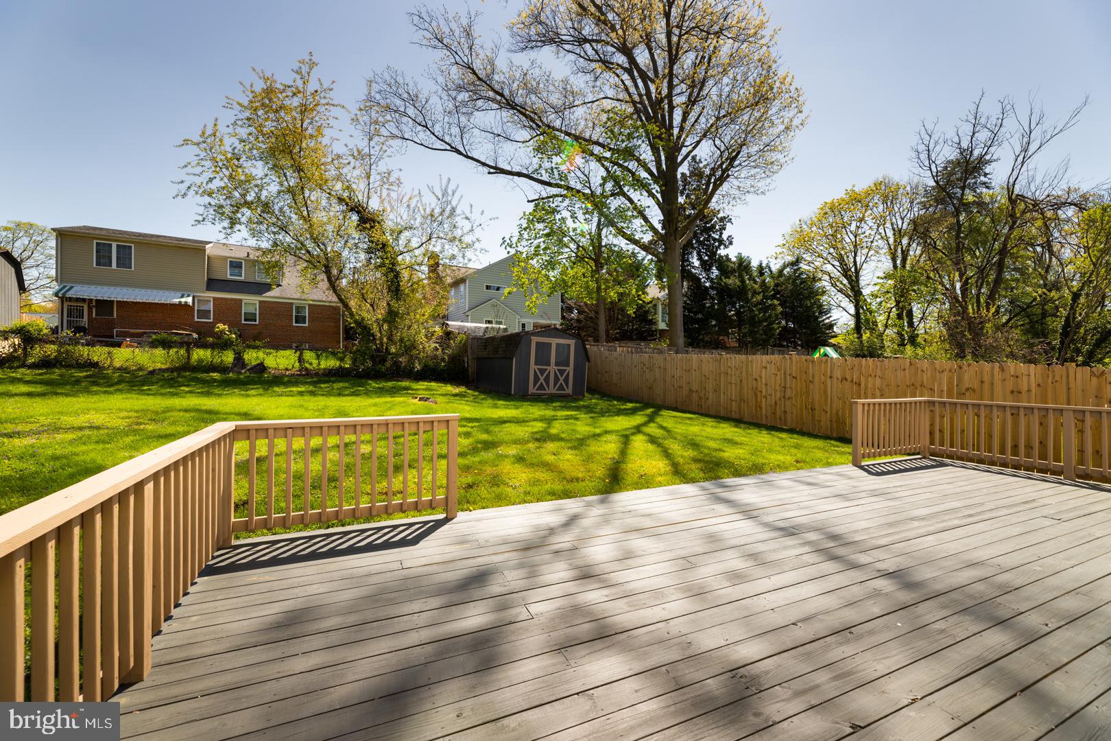 10009 Raynor Road Silver Spring, MD 20901 - Photo 29 of 34 a view of swimming pool with an outdoor space and seating area