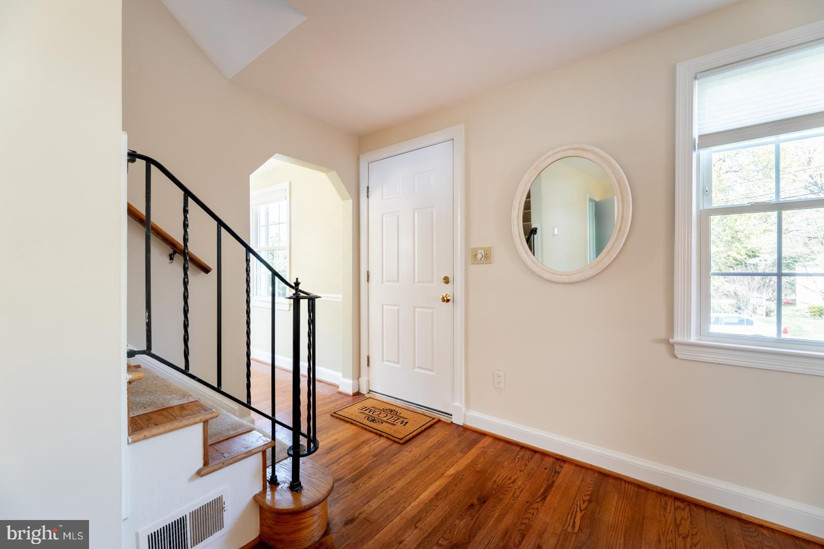 10009 Raynor Road Silver Spring, MD 20901 - Photo 4 of 34 a view of an entryway with wooden floor and door
