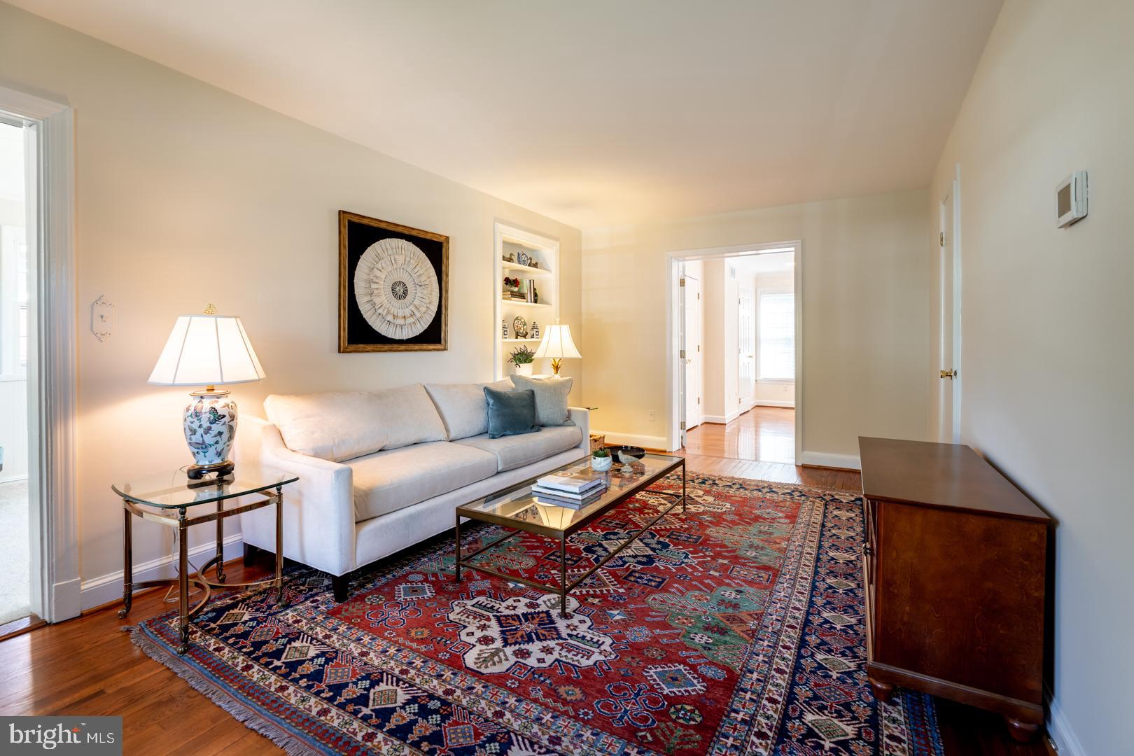 10009 Raynor Road Silver Spring, MD 20901 - Photo 5 of 34 a living room with furniture a rug and a window