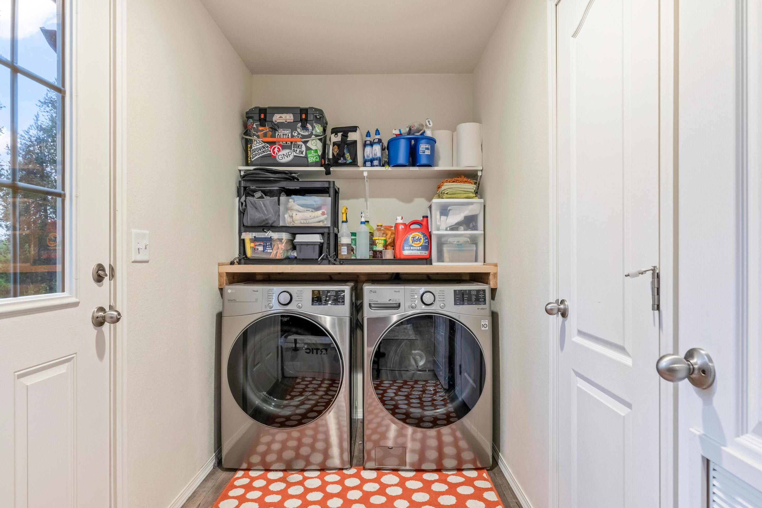 55823 Snow Goose Road Bend, OR 97707 - Photo 21 of 36 a view of washer and dryer in a utility room