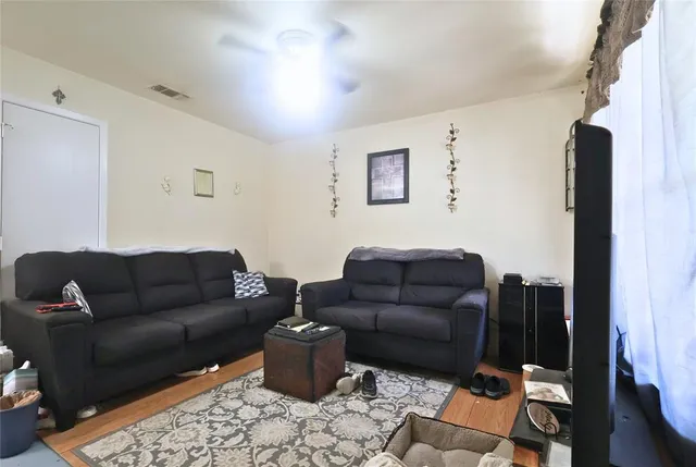 a living room with furniture and a couch