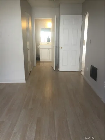 a view of a livingroom with a kitchen