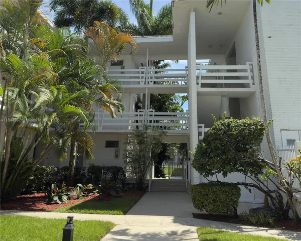 a view of swimming pool with outdoor seating