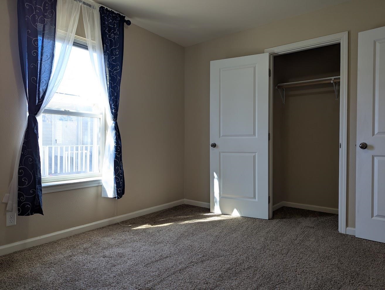 435 32 Road, Unit 907 Clifton, CO 81520 - Photo 14 of 24 an empty room with windows