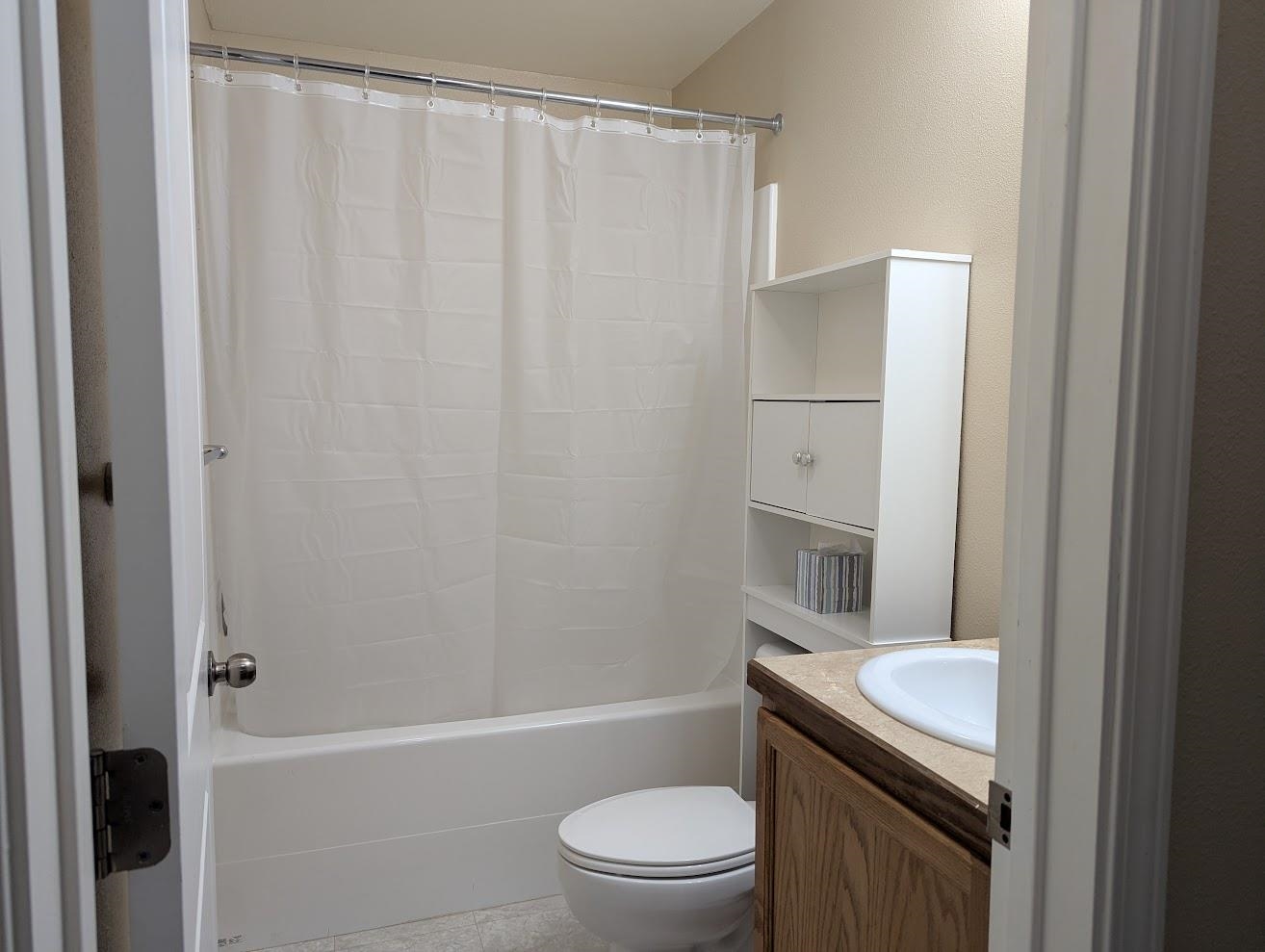 435 32 Road, Unit 907 Clifton, CO 81520 - Photo 17 of 24 a bathroom with a granite countertop bathtub shower sink vanity and toilet