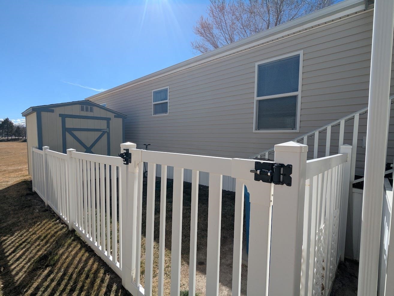 435 32 Road, Unit 907 Clifton, CO 81520 - Photo 23 of 24 a view of a house with wooden fence