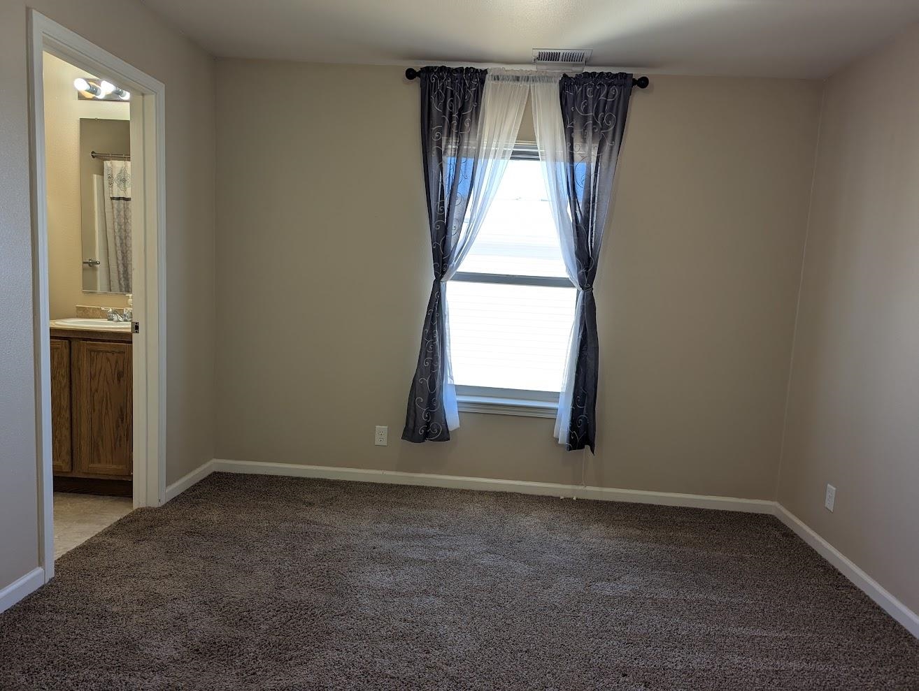 435 32 Road, Unit 907 Clifton, CO 81520 - Photo 10 of 24 an empty room with windows