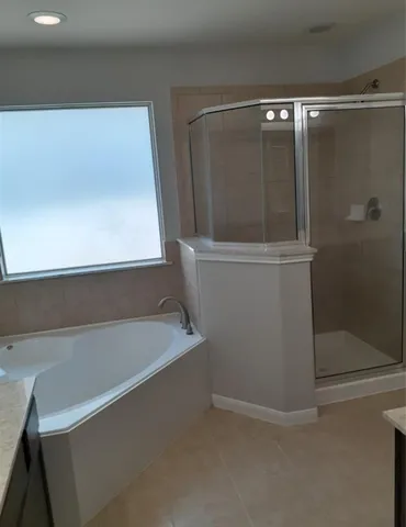 a bathroom with a bathtub