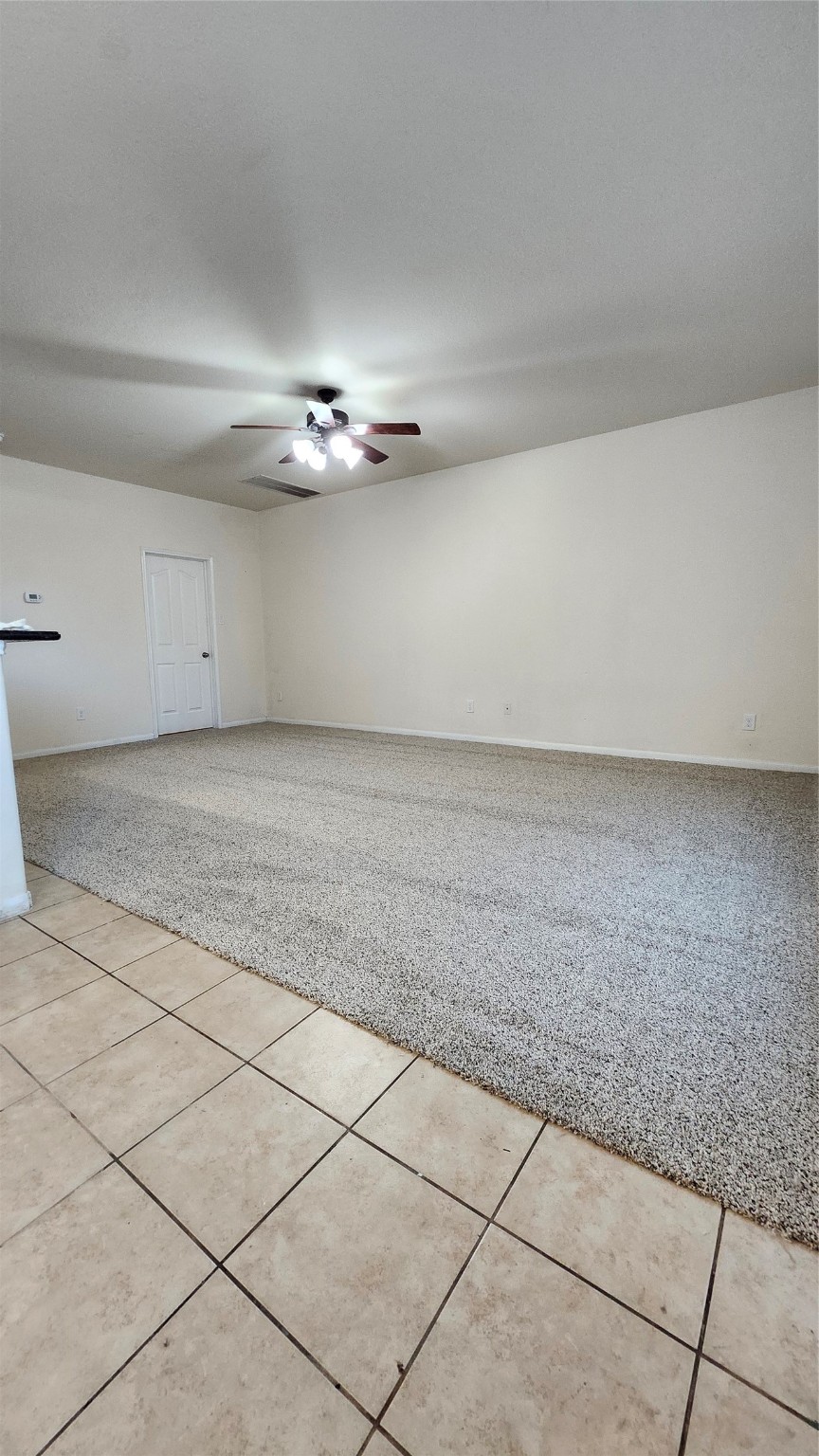 17122 Amarose Drive Houston, TX 77090 - Photo 3 of 12 a view of a room with an empty space