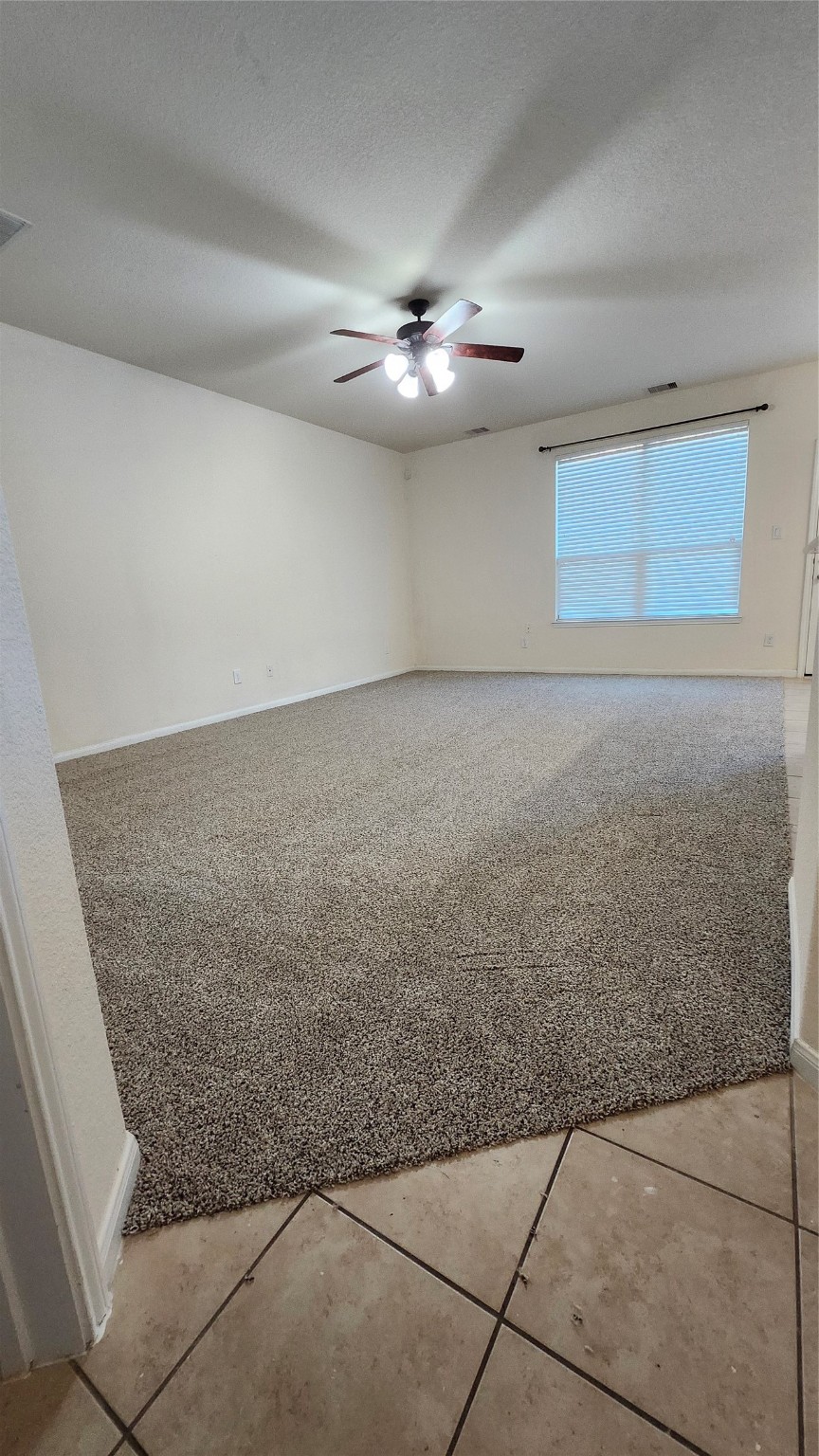 17122 Amarose Drive Houston, TX 77090 - Photo 4 of 12 a view of an empty room