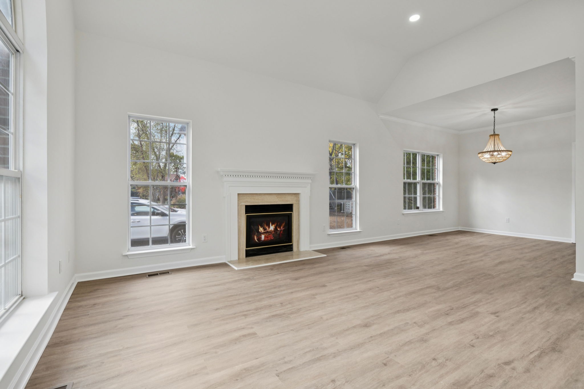 4909 John Hagar Road Hermitage, TN 37076 - Photo 14 of 67 wooden floor fireplace and windows in an empty room