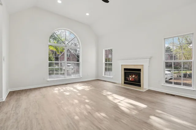 a kitchen with stainless steel appliances a refrigerator stove and microwave