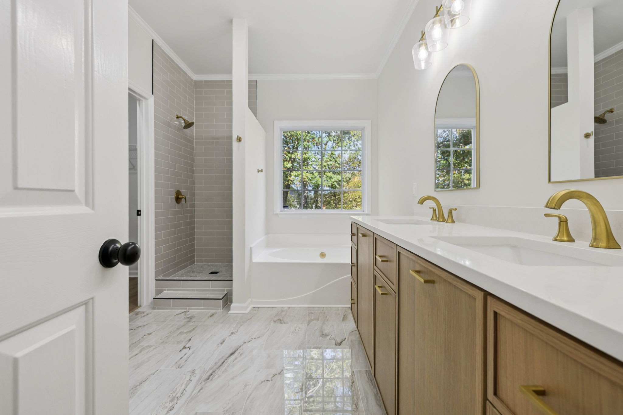 4909 John Hagar Road Hermitage, TN 37076 - Photo 32 of 67 a spacious bathroom with a sink and a mirror