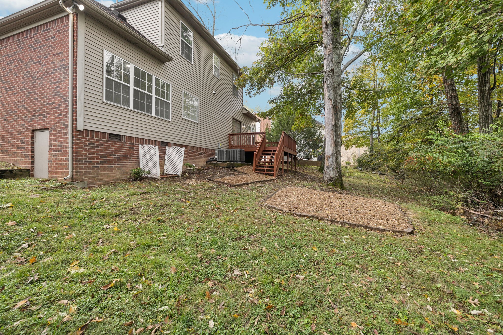 4909 John Hagar Road Hermitage, TN 37076 - Photo 57 of 67 a backyard of a house with table and chairs
