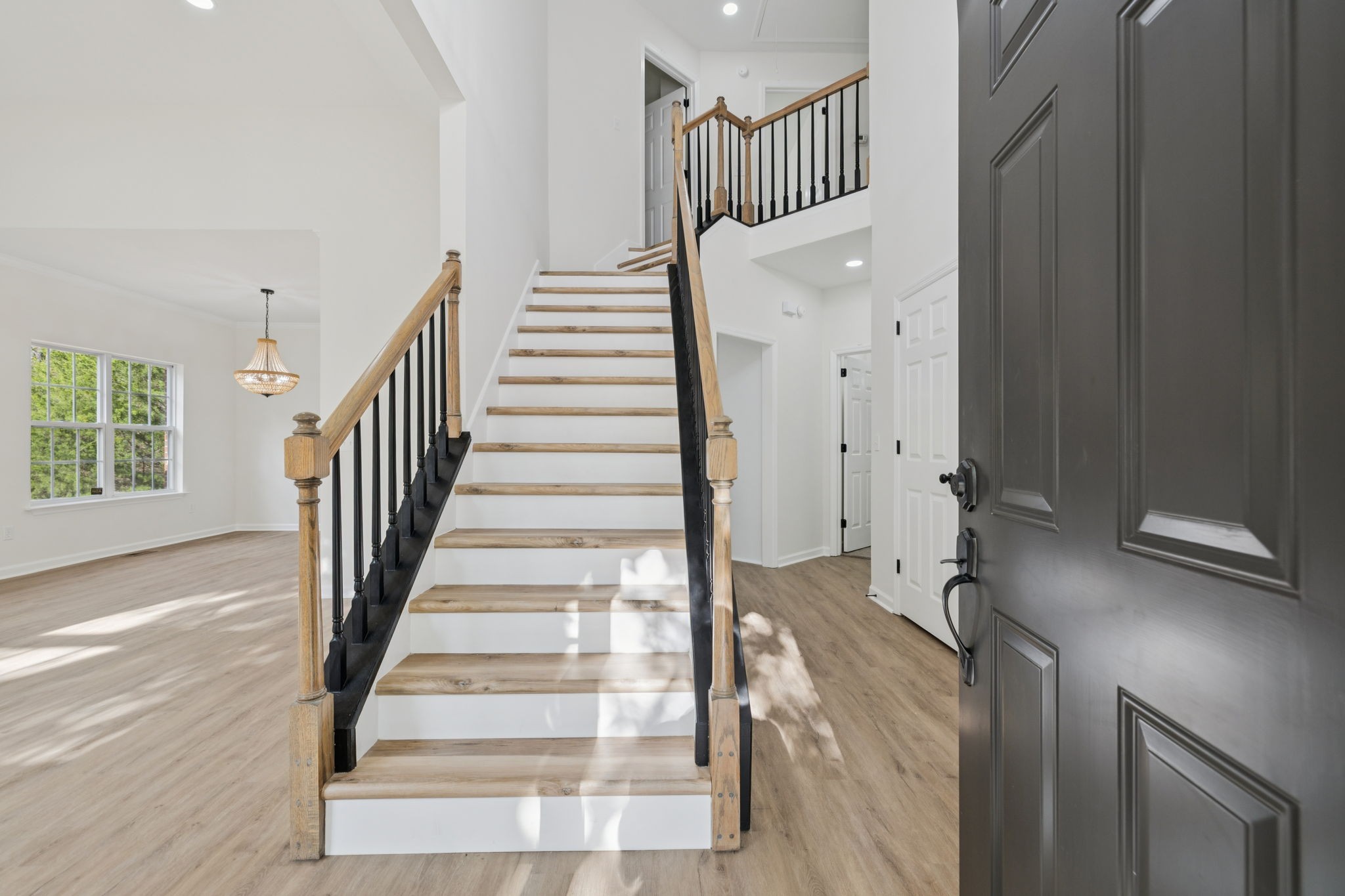 4909 John Hagar Road Hermitage, TN 37076 - Photo 6 of 67 a view of staircase with white walls and windows