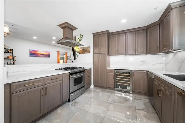 a kitchen with a stove and cabinets