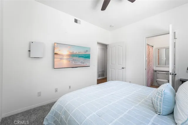 a view of a dining room with furniture and a window