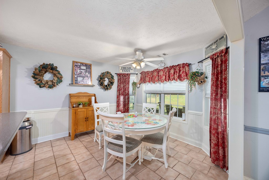 2083 Johnson Mill Road Hamilton, GA 31811 - Photo 11 of 54 a dining room with furniture and window