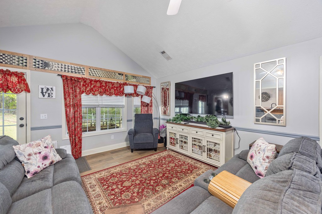 2083 Johnson Mill Road Hamilton, GA 31811 - Photo 14 of 54 a living room with furniture and a flat screen tv
