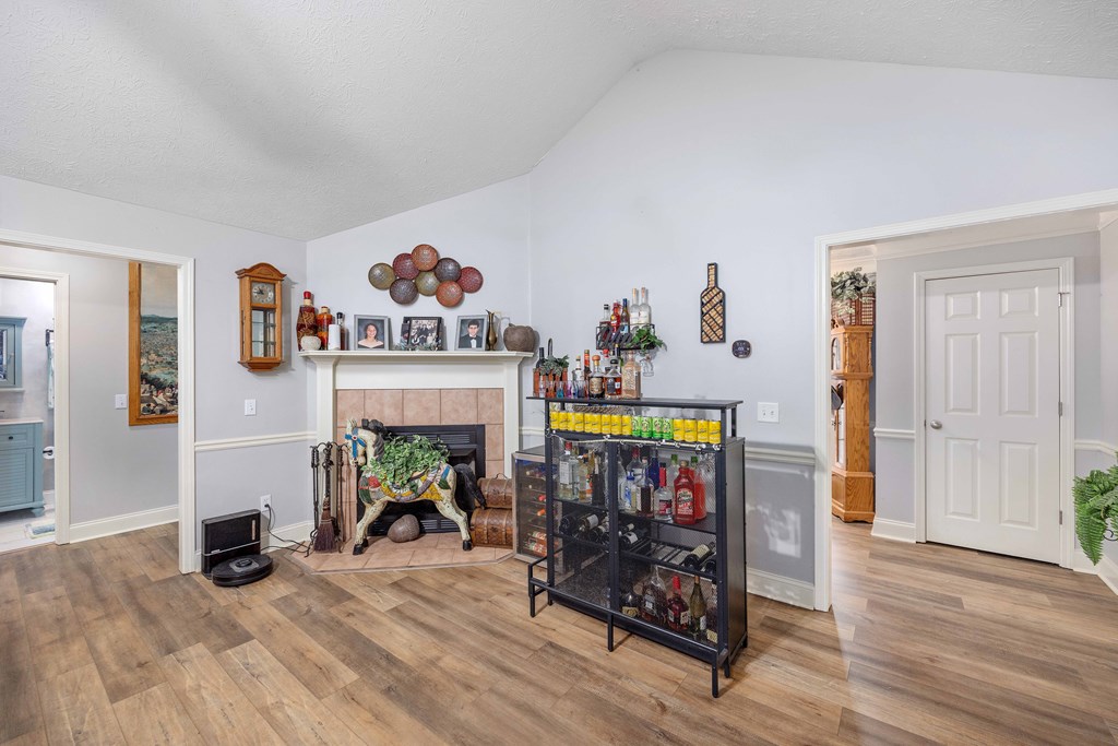 2083 Johnson Mill Road Hamilton, GA 31811 - Photo 15 of 54 a view of game room with furniture and wooden floor