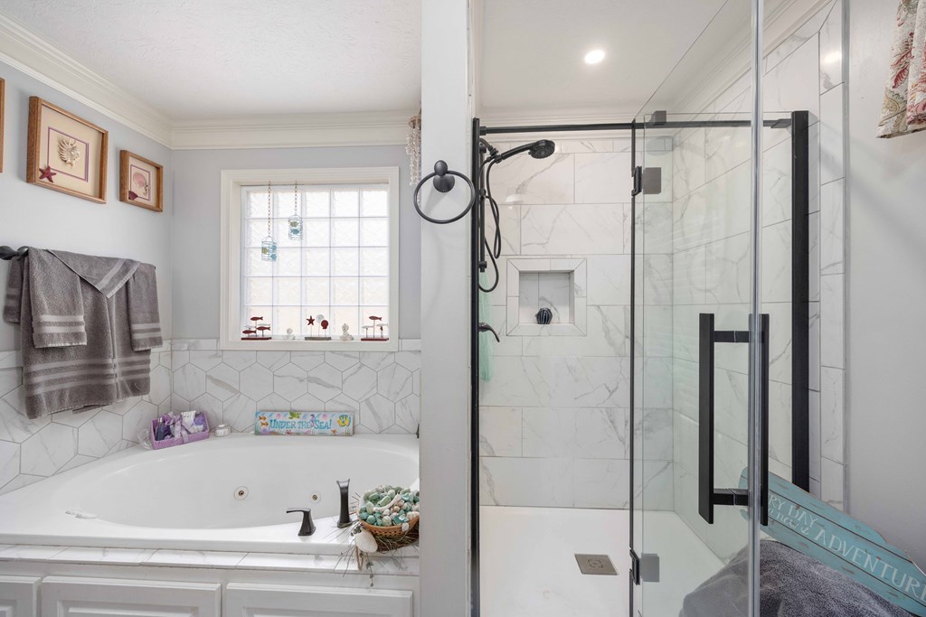 2083 Johnson Mill Road Hamilton, GA 31811 - Photo 25 of 54 a bathroom with a bathtub and a shower