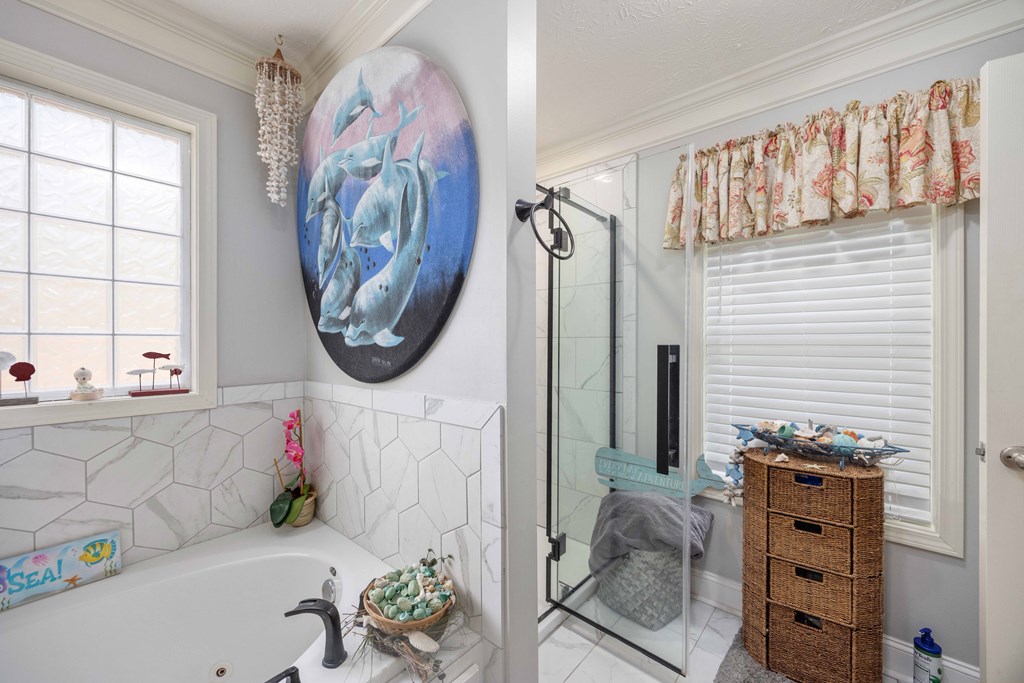 2083 Johnson Mill Road Hamilton, GA 31811 - Photo 27 of 54 a bathroom with a bathtub and a shower