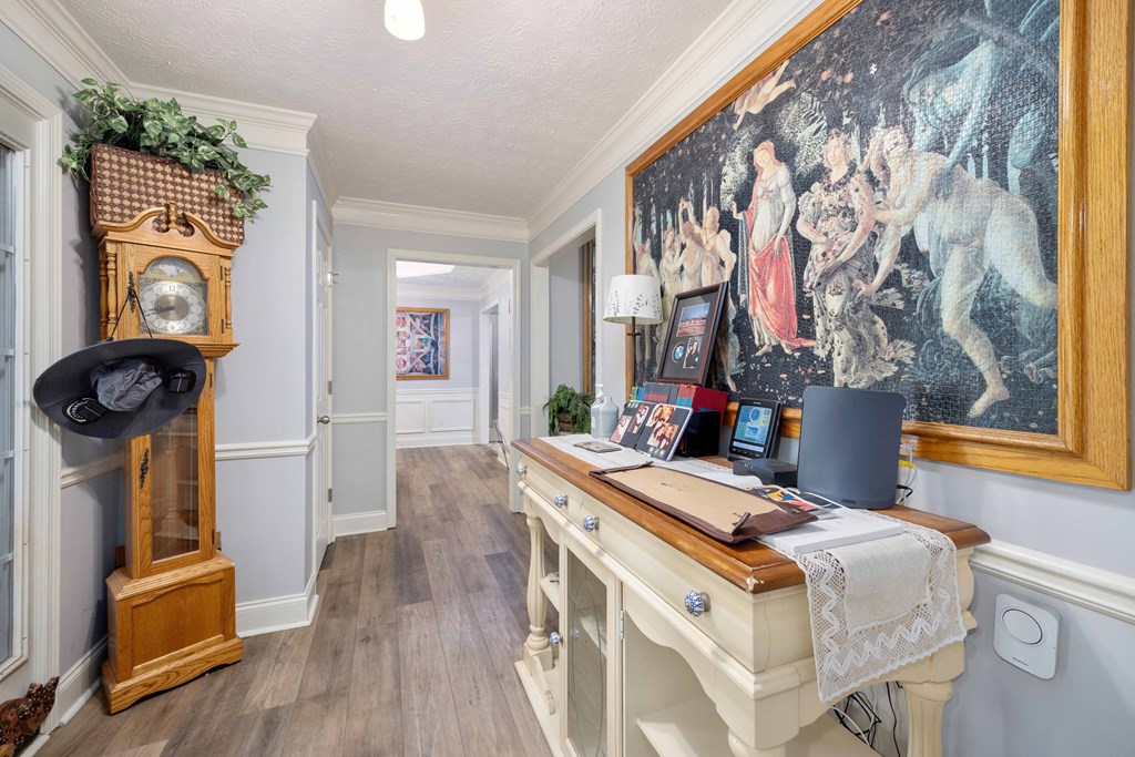 2083 Johnson Mill Road Hamilton, GA 31811 - Photo 3 of 54 a bedroom with a bed and a mirror on the dresser