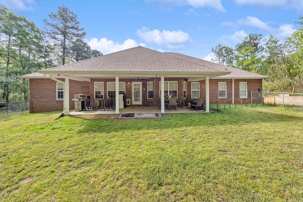 2083 Johnson Mill Road Hamilton, GA 31811 - Photo 32 of 54 a front view of house with yard and green space