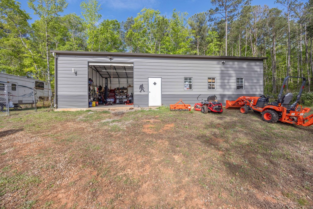 2083 Johnson Mill Road Hamilton, GA 31811 - Photo 39 of 54 a view of a house with car parked