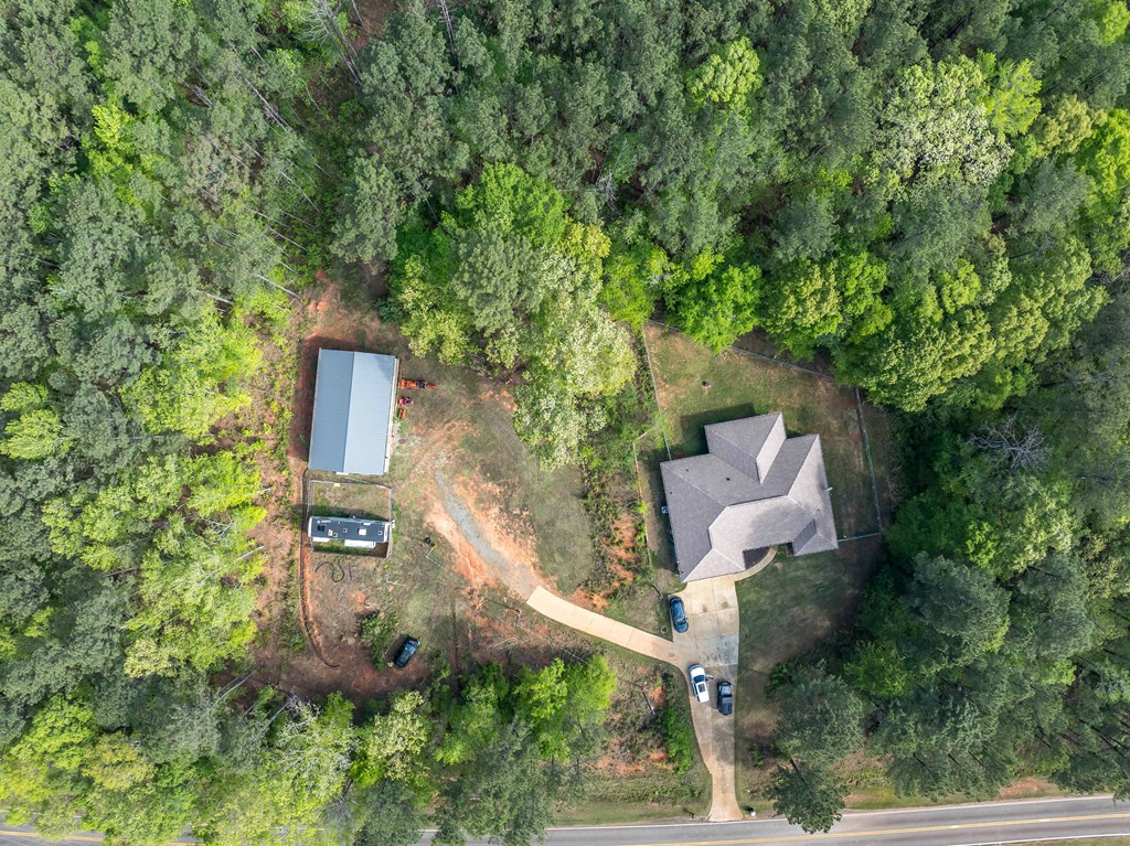 2083 Johnson Mill Road Hamilton, GA 31811 - Photo 52 of 54 an aerial view of a house with a yard