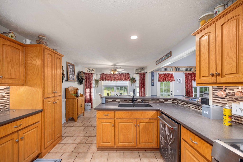 2083 Johnson Mill Road Hamilton, GA 31811 - Photo 6 of 54 a kitchen with stainless steel appliances granite countertop a sink a stove and a refrigerator