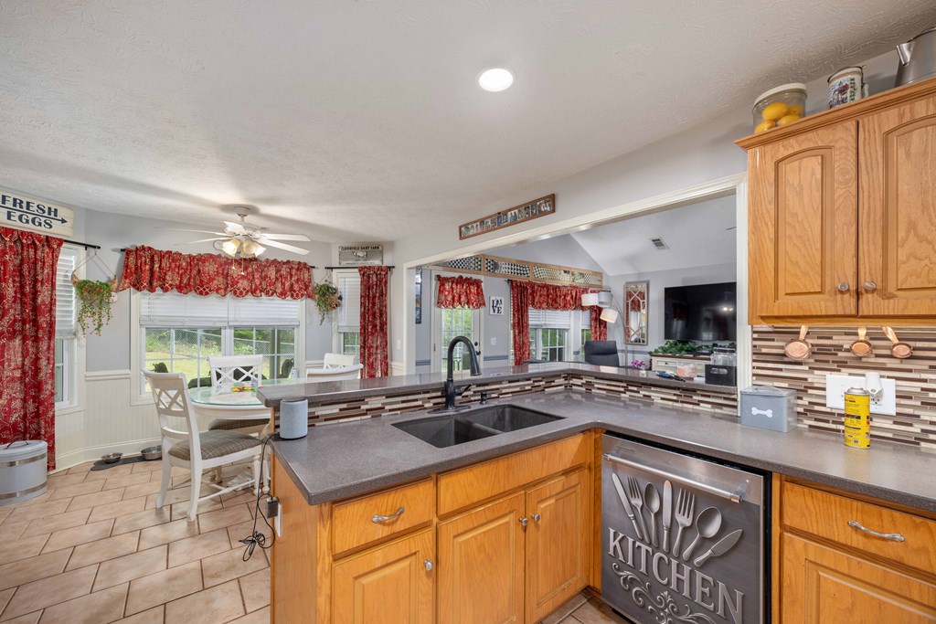 2083 Johnson Mill Road Hamilton, GA 31811 - Photo 7 of 54 a kitchen with stainless steel appliances granite countertop a sink and cabinets