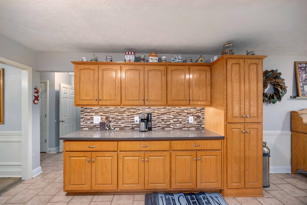 2083 Johnson Mill Road Hamilton, GA 31811 - Photo 8 of 54 a bathroom with a granite countertop sink and a mirror