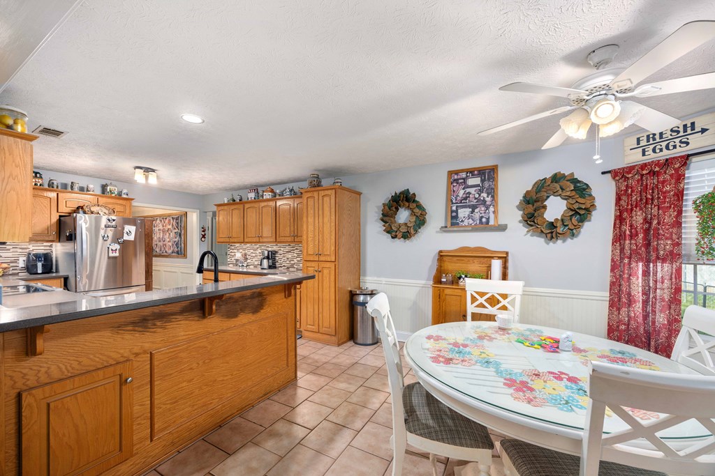 2083 Johnson Mill Road Hamilton, GA 31811 - Photo 10 of 54 a large kitchen with a table and chairs