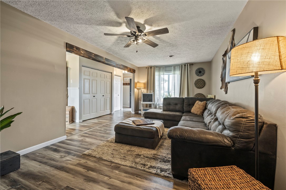 8969 Franklin-Trenton Road Franklin, OH 45005 - Photo 30 of 49 This living room features modern flooring and offers an inviting atmosphere.