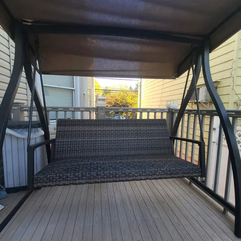 a view of entryway with wooden floor