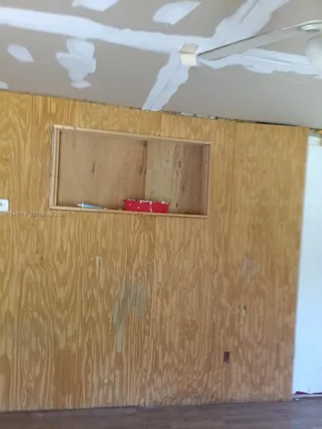 a view of a bathroom with a shower curtain