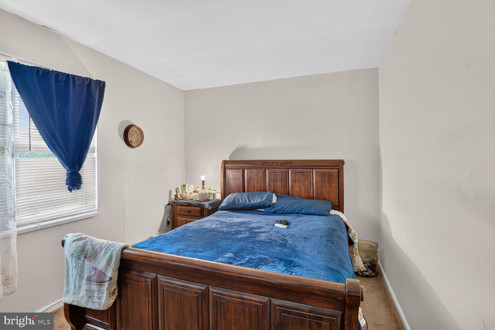 2015 Ray Leonard Road Landover, MD 20785 - Photo 9 of 15 Cozy bedroom with warm wooden accents.