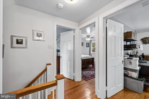 a view of a kitchen from the hallway