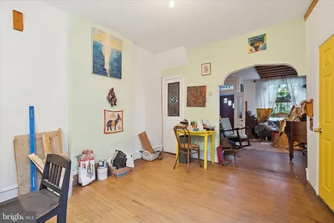 a kitchen with refrigerator and car