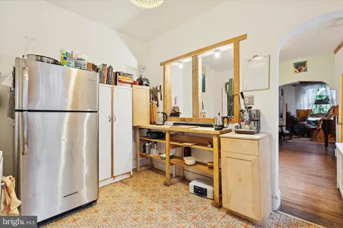 a view of a kitchen from the kitchen