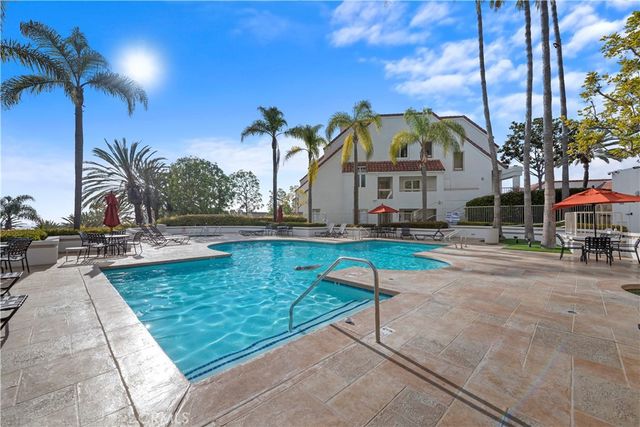 a view of a house with swimming pool