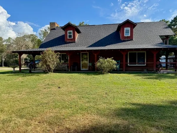 a view of house with outdoor space