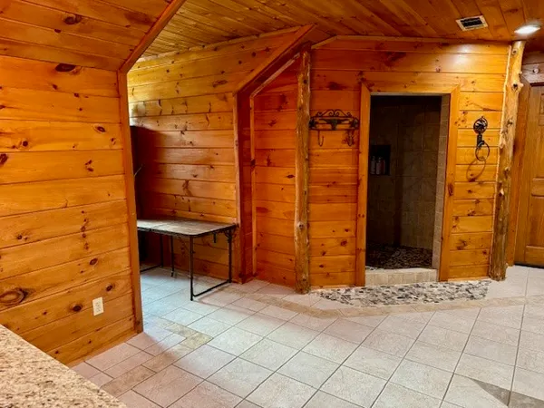 a view of a lake with a yard